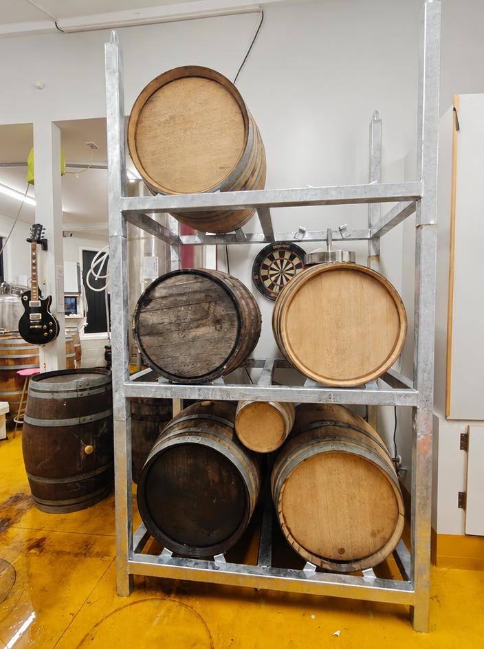 Oak casks resting in the rack room